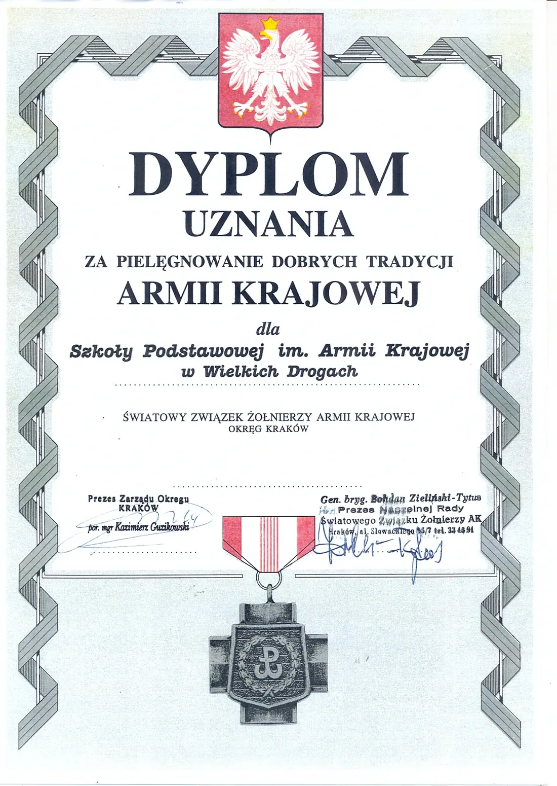 Ozdobny dyplom uznania z godłem Polski i krzyżem Armii Krajowej.